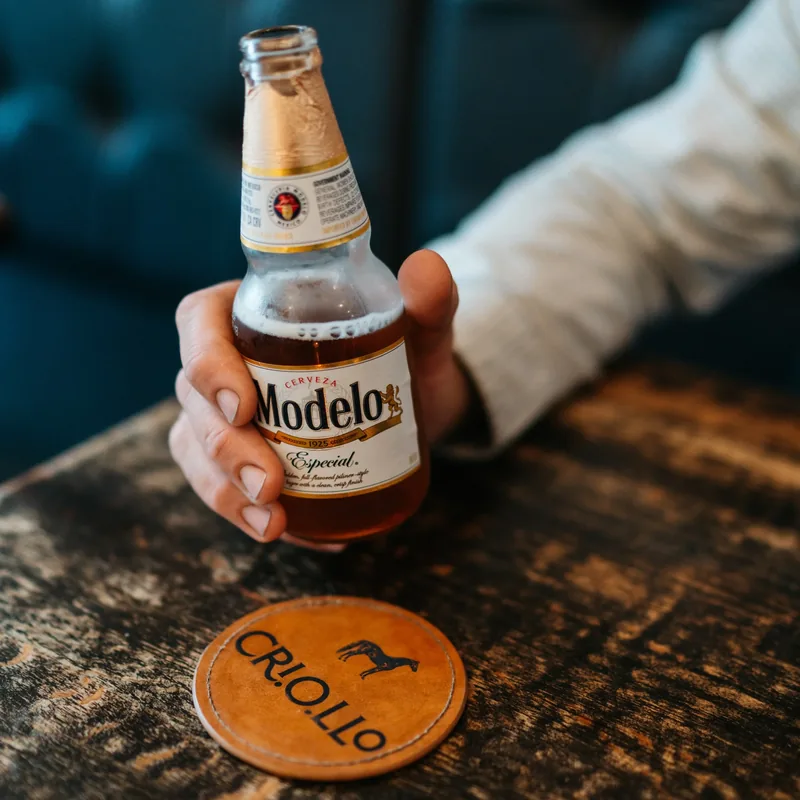 A Criollo leather coaster stamped with the horse mark