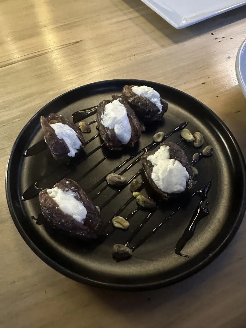 Chocolate dessert plated with cream